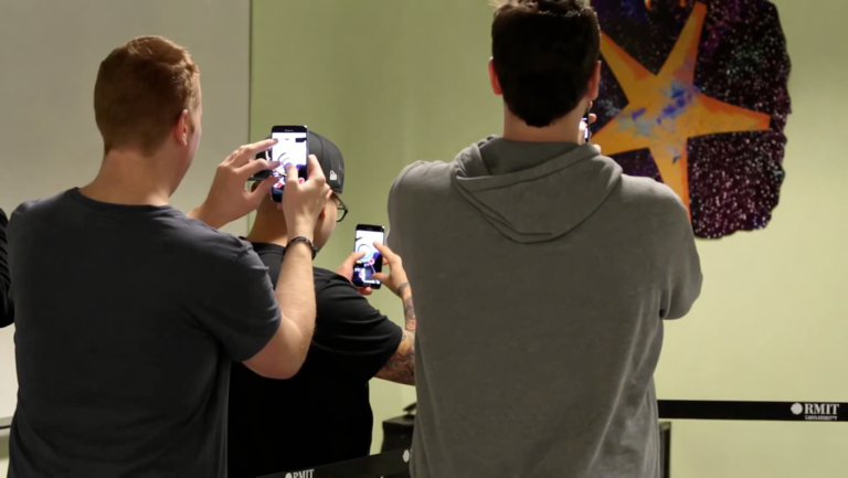 Reducing Perceived Waiting Time in Theme Park Queues via an Augmented Reality Game